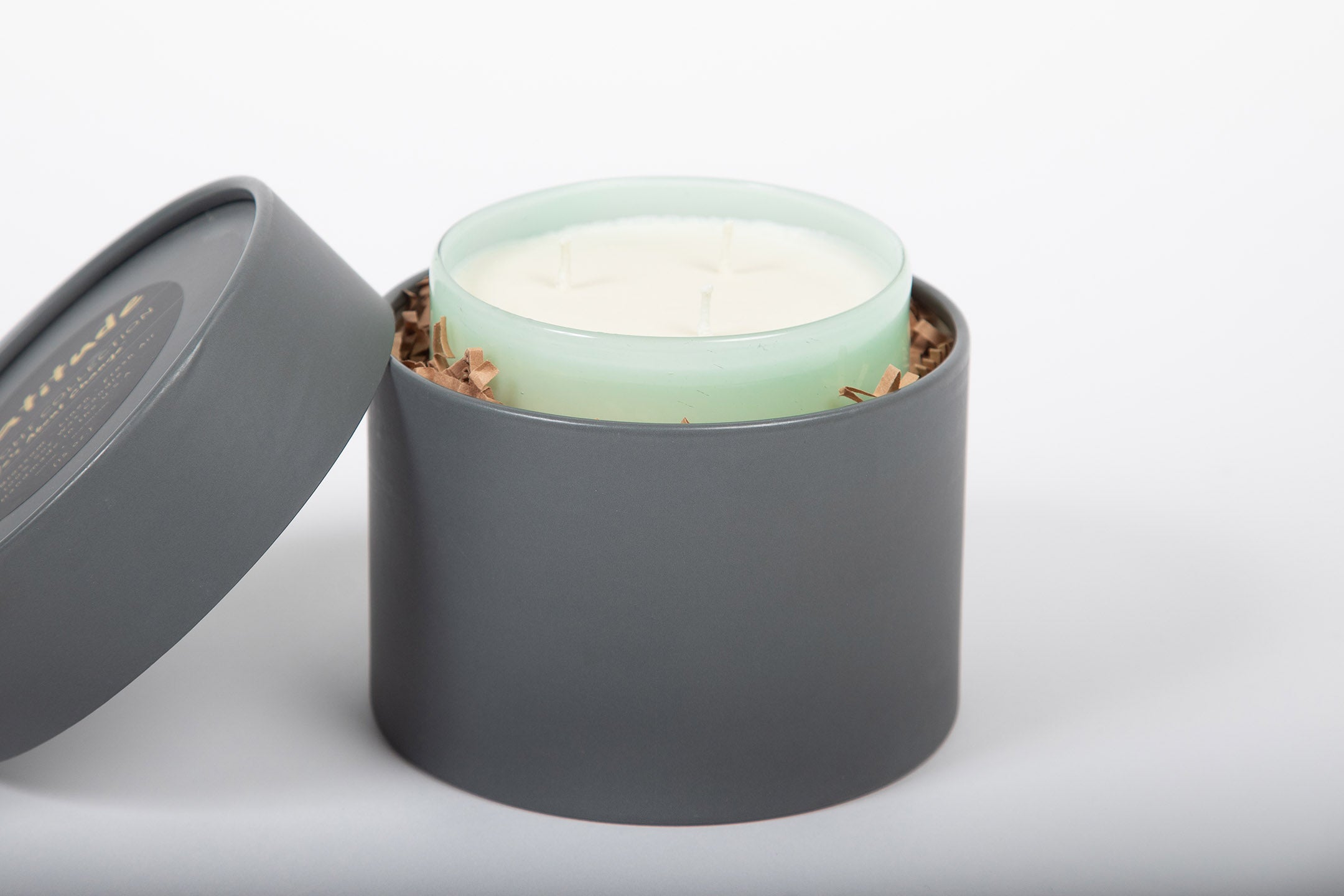 Celebrate Green Hand Blown Glass Candle from Life's About Change Light Collection