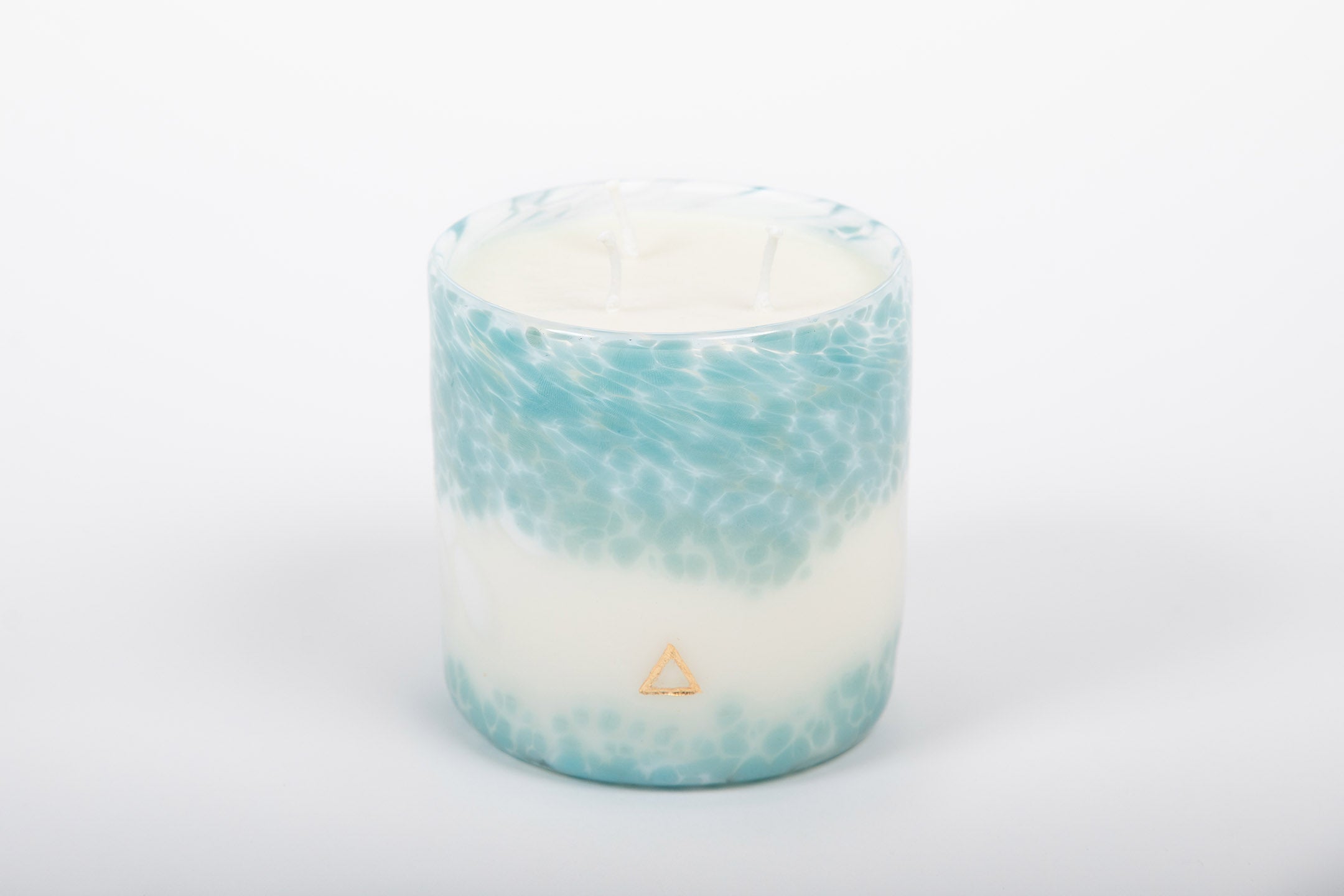 Peace Steel Turquoise & White Hand Blown Glass Candle from Life's About Change Light Collection